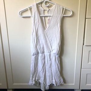 White crinkle linen romper with attached slip
